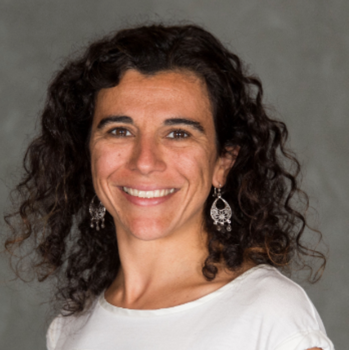 Image is professional headshot of Dr. Laia Balcells. 