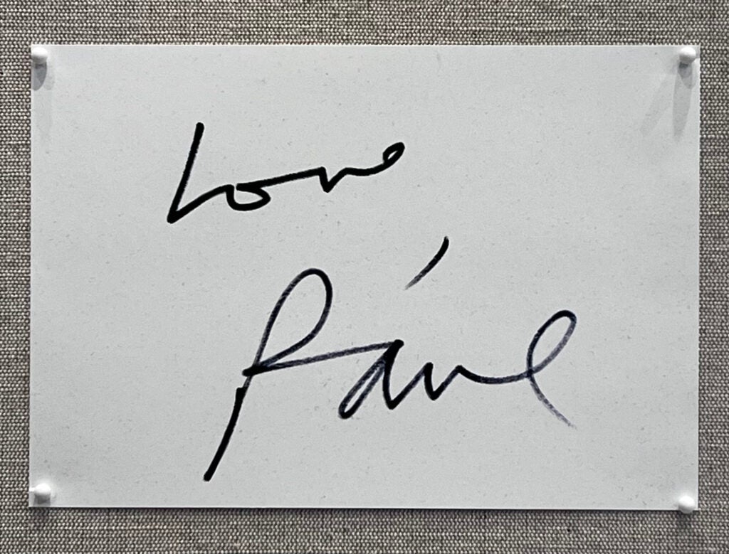 An image with the text "Love, Paul" in Paul Muldoon's handwriting